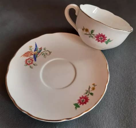 LOT 354 1 tasse en faïence de DIGOIN SARREGUEMINES Oiseau de paradis