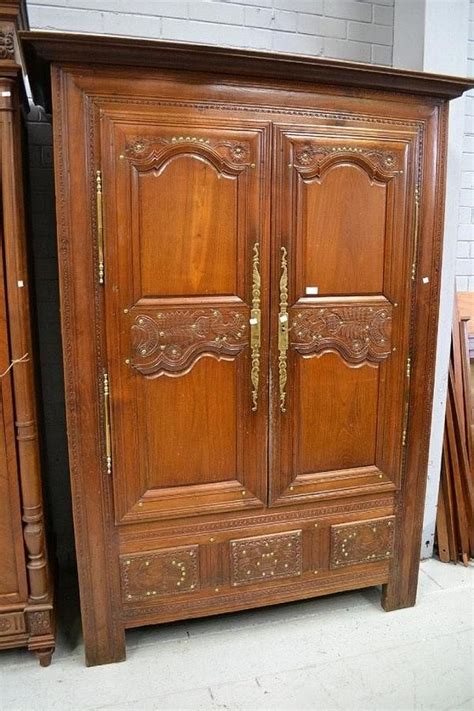 French Brittany Carved Oak Armoire With Brass Decoration Wardrobes