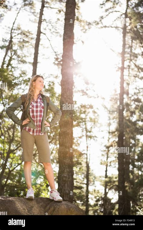Pretty Blonde Hiker Standing On Stone Stock Photo Alamy