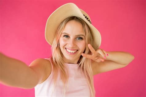Premium Photo Blonde Influencer Taking A Selfie