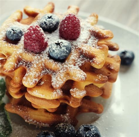 Premium Photo Belgian Waffles With Blueberries Raspberries And