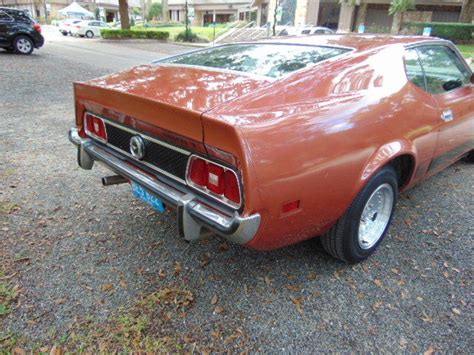 Seller of Classic Cars - 1973 Ford Mustang (Burnt orange/Tan)