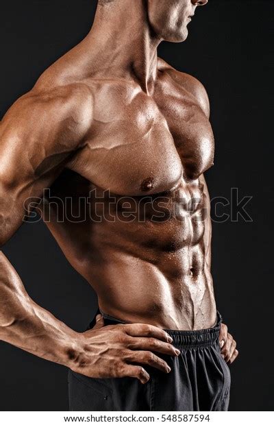 Beautiful Naked Male Torso Against Black Stock Photo Edit Now 548587594