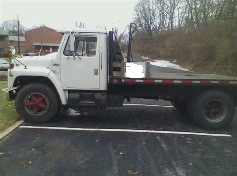 1984 International flatbed with parts truck for sale