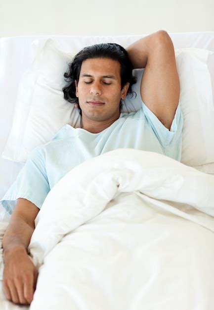 Male Patient Sleeping In A Hospital Bed Photo Premium Download