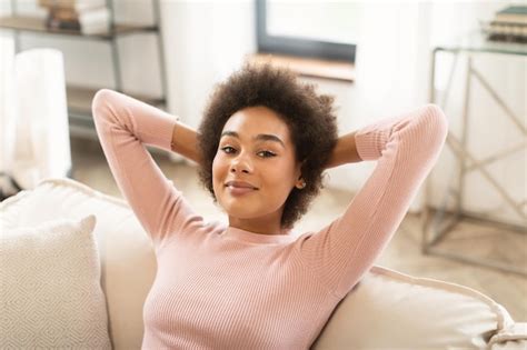 Premium Photo Cheerful Relaxed Millennial African American Woman