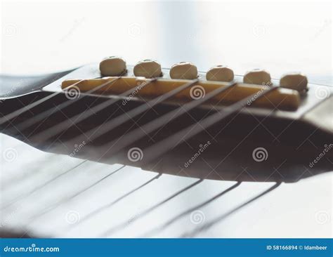 guitar saddle stock photo image  acustic acoustic