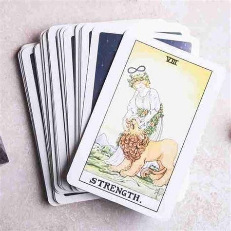 Strength Tarot Card Meaning Love Money Health And More Slash And