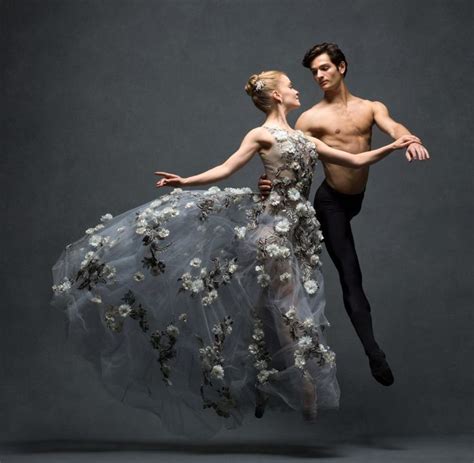 A Man And Woman Are Dressed In Ballet Clothes