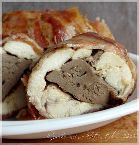 Bacon Wrapped Meatloaf On A White Plate