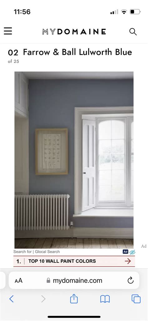 An Image Of A Room With Blue Walls And White Trim On The Window Sill