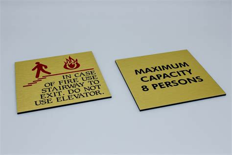 Brushed Aluminum warning signs with a golden finish | Front Signs