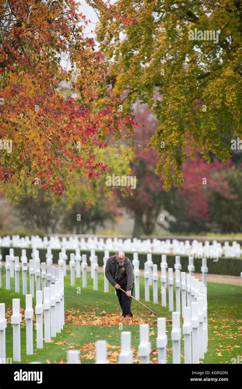 Gardener Mick Howard Cleaning One Of The 3 811 Headstones At The