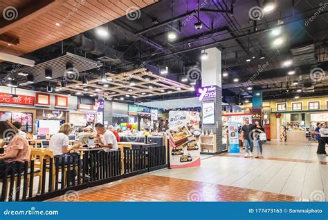 People Eating And Drinking In Food Court At Terminal Asoke Montri