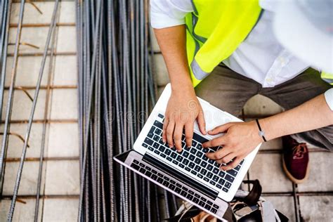 Details of Engineer Working on Laptop on Construction Site Stock Image ...