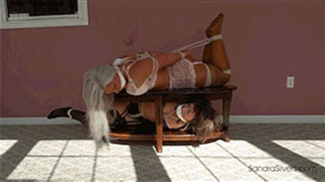 Super Struggling As Two MILF Damsels In Lingerie Left Hogtied On The Coffee Table 1981 SD