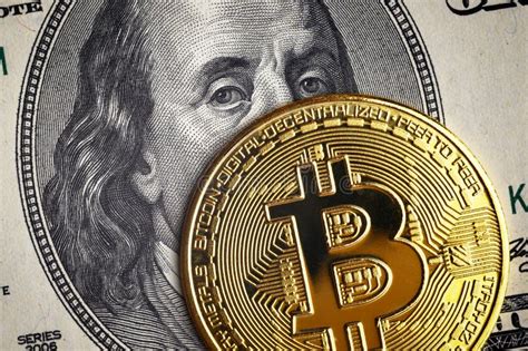 Bitcoin Vs Us Dollar Gold Bit Coin On Dollar Bill Stock Photo