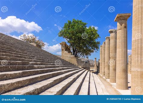 Panoramic View Of Ruins Of Ancient City Of Lindos On Colorful Island Of