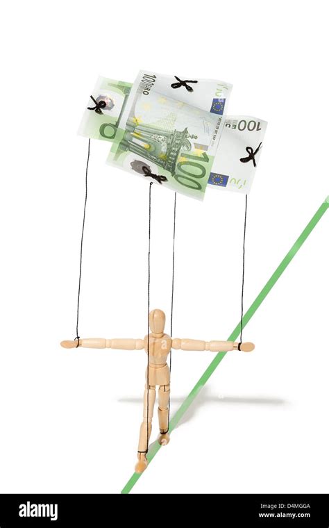 Concept A Puppet Controlled By Money Stock Photo Alamy