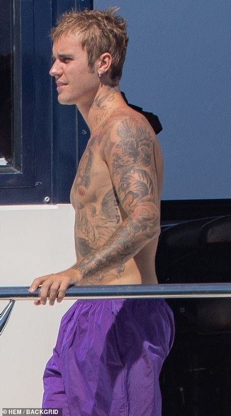 Justin Bieber Ditches The Shirt As He Embraces His Bikini Clad Wife