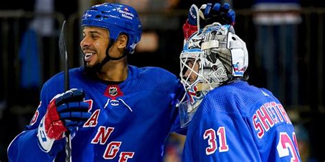 Rangers' Ryan Reaves brawls with Wild's Marcus Foligno, points to his ...