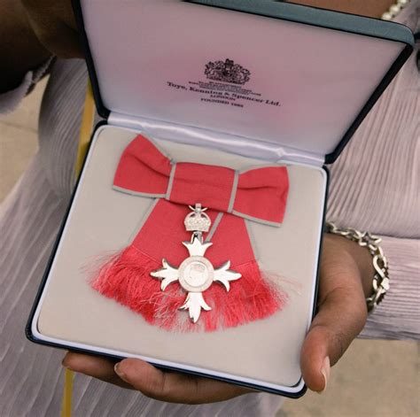 Photos Nigerian Lady Anne Marie Imafidon Receives An MBE From Queen