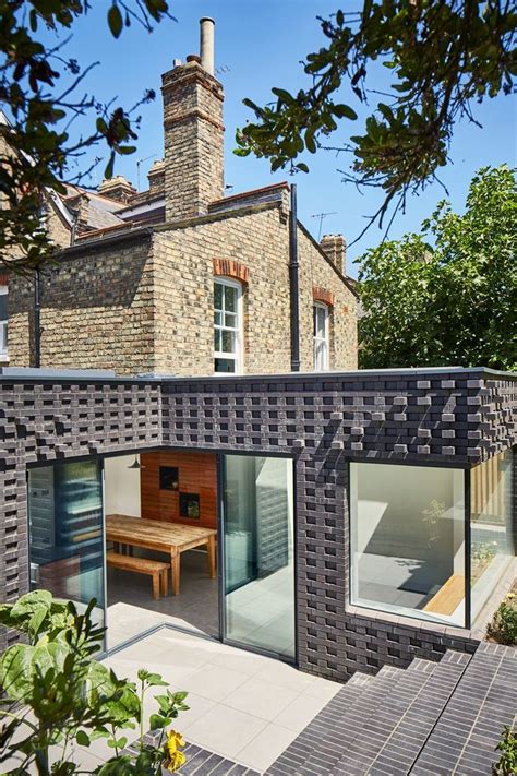 Staffordshire Blue Bricks Create Hit And Miss Textured Brickwork On House Extension House