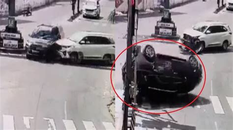 Captured On Camera Speeding Suv Jumps Red Light Crashes And Flips Multiple Times On Busy Road