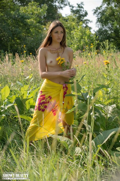 Naked Brunette In Tall Grass