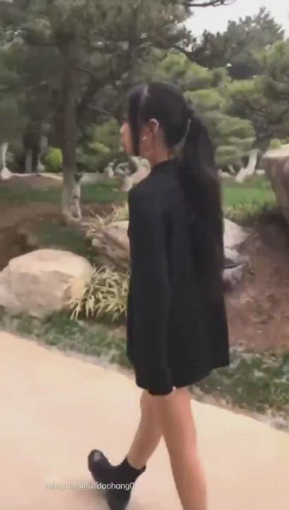 Asian Girl In The Park Scrolller