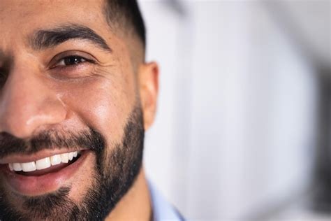 Premium Photo Half Portrait Of Happy Biracial Male Doctor In Hospital