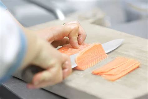 Chef Cutting Salmon Fish Stock Photos Royalty Free Chef Cutting Salmon