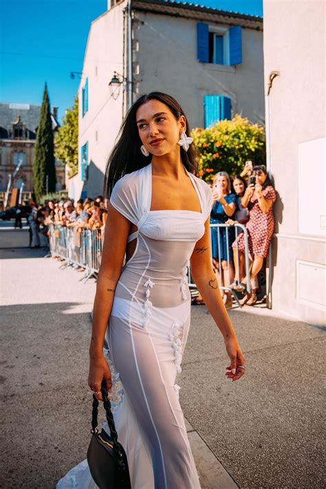 Dua Lipa Wore A Sheer White Dress To The Jacquemus Wedding See Photos