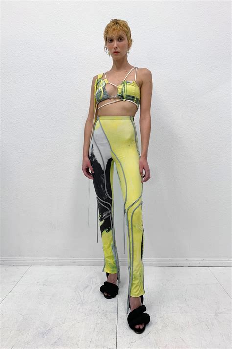 Cardi B Turns Up Heat In Yellow Bikini Top As She Arrives At Super Bowl LV Luxury Suite With