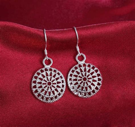 Sterling Silver Medallion Dangle Earrings in 2022 | Sterling silver, Silver, Earrings