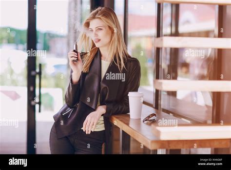 Beautiful Blonde In A Cafe Stock Photo Alamy