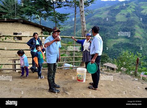 Drinking chicha ((fermented corn ) - Race - Fiestas Virgen del Carmen in LA ZUNGA - Ecuador ...