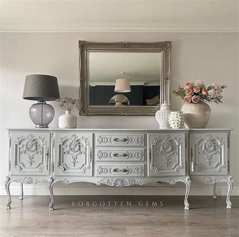 Ornate White Dresser with Flowers and Mirror