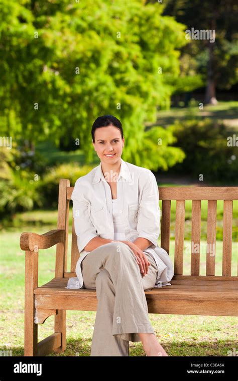Brunette Woman On The Bench Stock Photo Alamy
