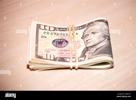 Wad Of Bills Us Banknotes Folded Cash Of Dollar Bills Stock Photo Alamy