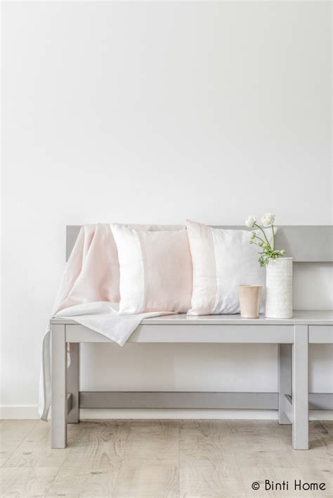 Binti Home Blog Soft Pink Cushions On A Light Grey Bench