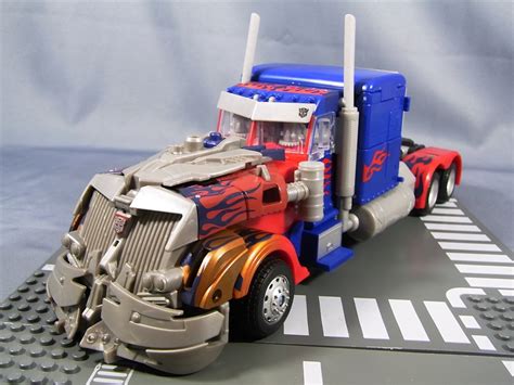 Dark of the Moon Striker Optimus Prime In Hand Images - Transformers ...