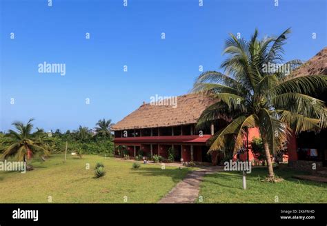 Traditional African Houses On The Axim Tropical Beach In Ghana West