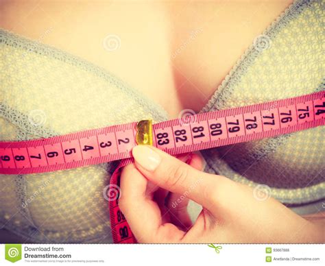 Woman In Bra Lingerie Measuring Her Chest Breasts Stock Photo Image