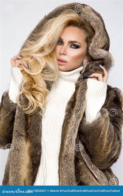 Beautiful Blond Model Wearing A Dress And Elegant Fur Coat Stock Image Image Of Background