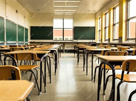 Premium Photo | Desks and chairs arranged in classroom at high school