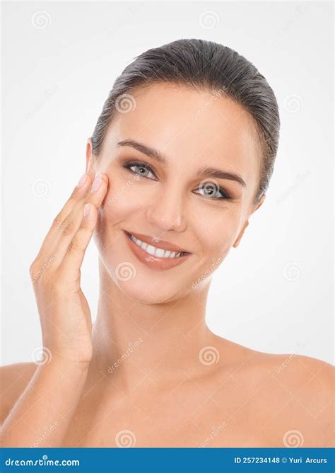 Perfecting Perfection Studio Beauty Shot Of An Attractive Brunette Woman Stock Photo Image