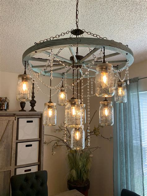 Large Blue Wagon Wheel Chandelier With Mason Jar Lights Etsy Wagon