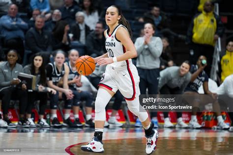 Uconn Huskies Guard Nika Mühl Brings The Ball Up The Court During The