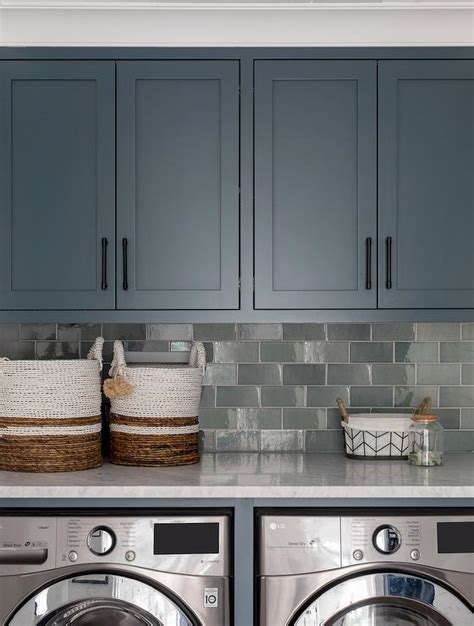 Blue Laundry Cabinets With Blue Subway Tiles Transitional Laundry Room